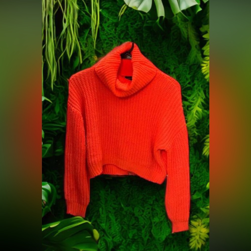 Cropped orange turtleneck knit sweater